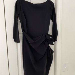 - A fabulous black dress. Fitted and super flattering .